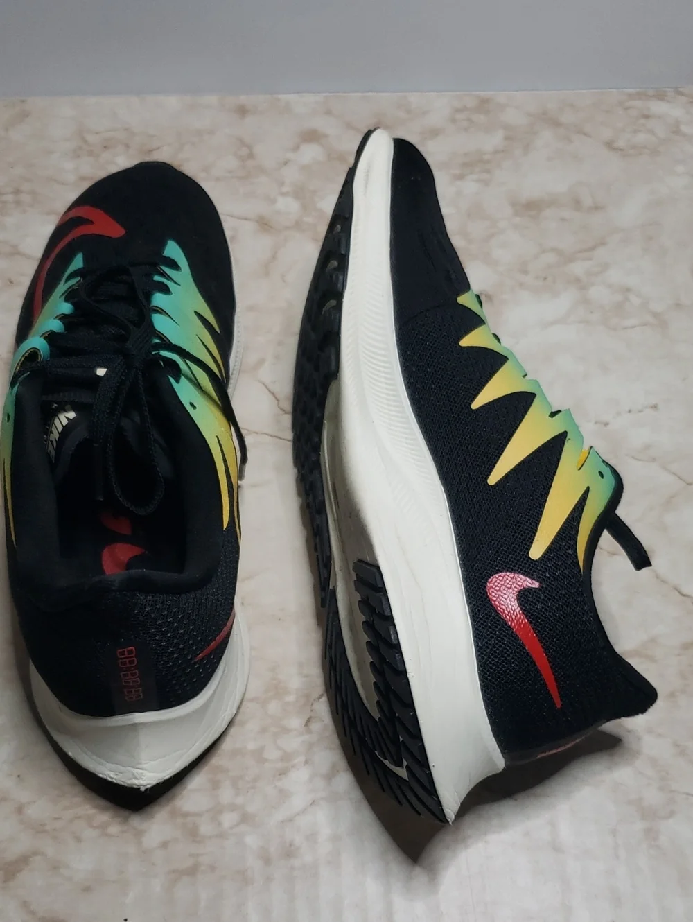 Nike Men’s Black Running Sneakers with Teal, Yellow & Red Accents 7.5
